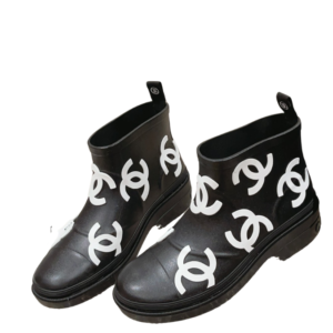 Chanel snow boots with white and black logo, also perfect for rainy days. $350, designed for women