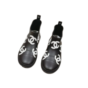 Chanel snow boots with white and black logo, also perfect for rainy days. $350, designed for women