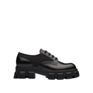 Prada lace up shoes in black leather with platform sole, priced at $300