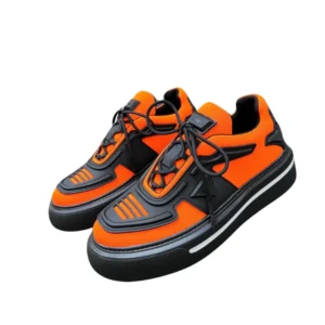Stylish orange Prada sneakers priced at $300. Features re-nylon and brushed leather