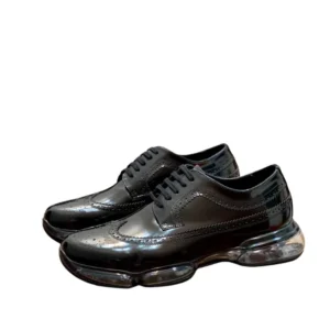 Prada Derby Shoes: Black leather shoes with a shiny sole, perfect for a stylish and sophisticated look
