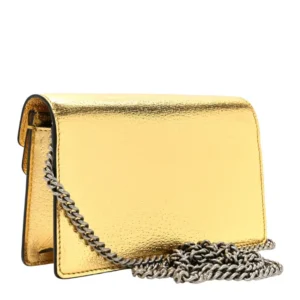 Stylish Gucci mini Dionysus Gold clutch bag with chain strap, perfect for a night out.