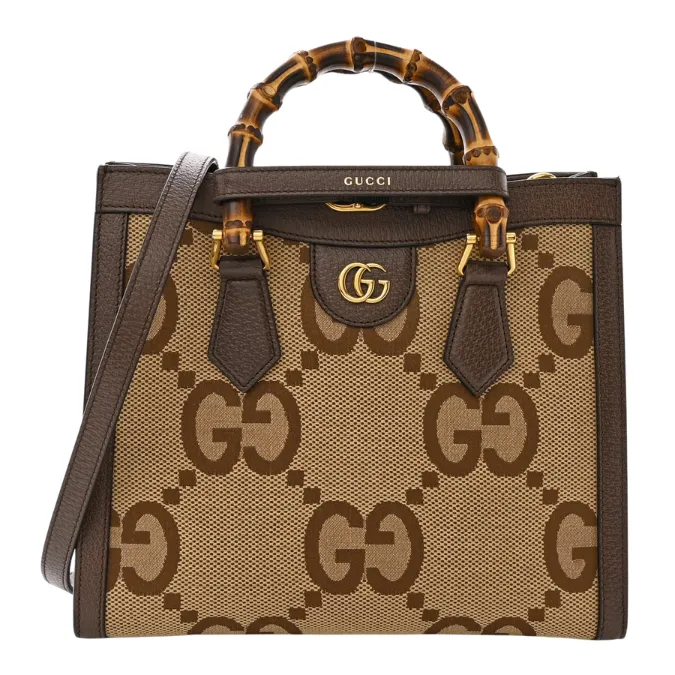 Stylish Gucci Small Diana 'GG' canvas tote bag, perfect for carrying essentials in luxury fashion.