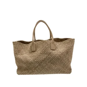 A stylish BV Tan Leather Cabat Tote bag with intricate weaving, perfect for carrying all your essentials in style.