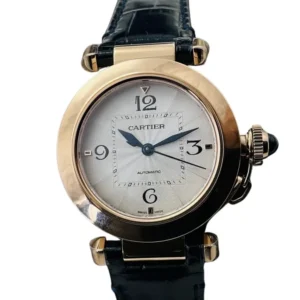 A sleek Cartier Pasha Gold watch, exuding elegance and sophistication, with a timeless design that captivates the eye.