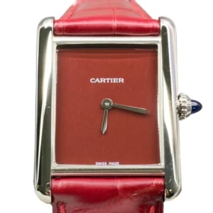Elevate your look with a classic Cartier Tank Must watch featuring a striking red band for a touch of sophistication.