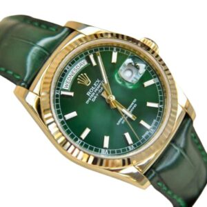 Rolex 36mm with a green dial and Day Date Yellow Gold—a luxurious timepiece exuding elegance and style