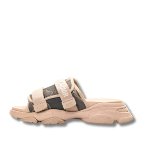 Dior D-wander Beige slides with side straps, perfect for a casual day out.