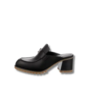 Elevate your style with these Hermes suede Flore 60 Mules, with a fashionable wooden heel.
