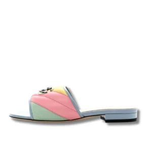 Vibrant GG Marmont Slides featuring a toe buckle for a trendy summer look.