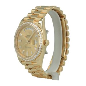 An opulent Gold Diamond Watch by Rolex, showcasing the elegance of a 40mm Day-Date timepiece