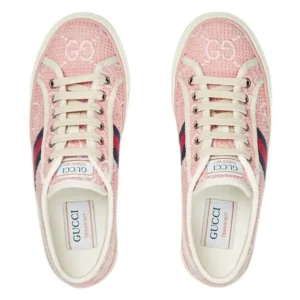 Gucci Tennis 1977 sneaker in pink and blue hues, featuring a vibrant red stripe for a trendy and sporty look.