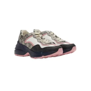 Gucci GG Rhyton sneakers featuring eye-catching pink, beige and blue elements, ideal for a fashion-forward look!
