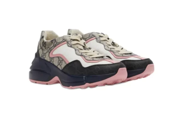 Gucci GG Rhyton sneakers featuring eye-catching pink, beige and blue elements, ideal for a fashion-forward look!