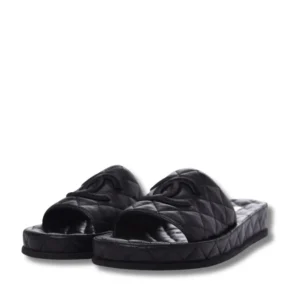 Chanel's Black Quilted Slides sandals, the epitome of luxury and sophistication.