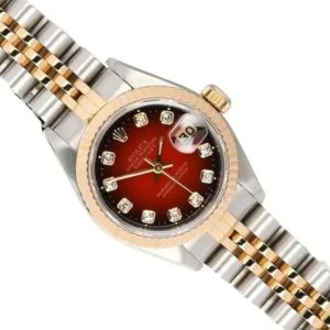 A luxurious Rolex Datejust Red dial ladies watch in 18k yellow gold with diamond accents.
