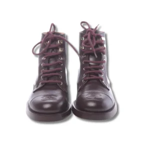 Step out in confidence with these Chanel leather Velvet short boots, featuring laces for a secure and fashionable fit.