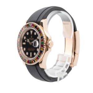 A black Rolex Yacht Master Everose Gold watch with vibrant stones adorning the face.