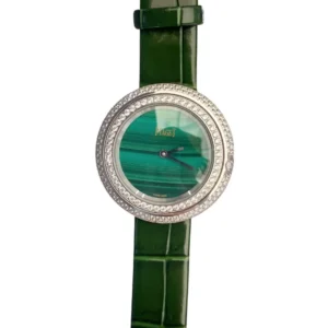 Piaget Green Dial watch adorned with silver bezel and shimmering diamonds.