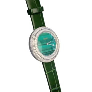 Piaget Green Dial watch adorned with silver bezel and shimmering diamonds.