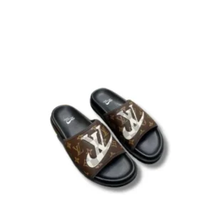 Step into luxury with Louis Vuitton Monogram Comfort Mules - a stylish and comfortable choice.