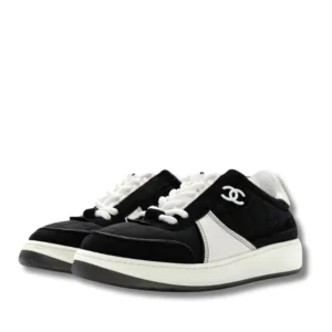 Black and white Cruise Chanel Platform sneakers, the epitome of luxury and style.