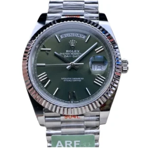 Stand out with a Rolex Day Date Green Dial, 40mm watch, a classic timepiece for the modern individual.