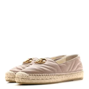 Stylish Gucci Marmont Espadrilles featuring a classy gold logo detail.