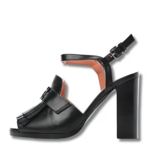 Black Hermes Leather sandals with fringe embellishment on the heel, a must-have for a trendy wardrobe.