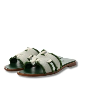 Stylish Hermes Oran Fringe Slides, perfect for summer outings.