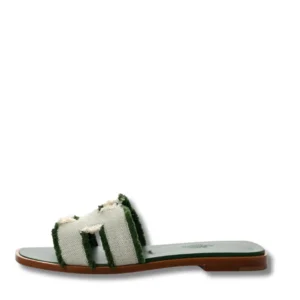 Stylish Hermes Oran Fringe Slides, perfect for summer outings.