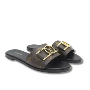 Fashionable LV Lock It Flat mules sandals featuring the iconic monogram design.
