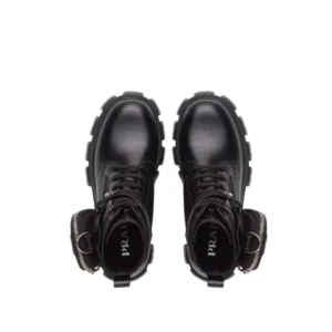 Sleek Prada Black Leather Monolith Combat Boots adorned with metal buckles & pockets, a must-have for any Fashionista men.