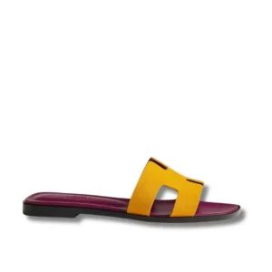 Step into summer with these vibrant Hermes Oran Slides featuring a famous H logo design.