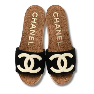 Step into luxury with these chic Chanel Black Suede Platform Mules - the perfect blend of style and comfort!