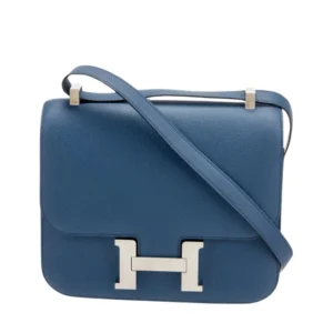 Stylish Hermes Constance 18 leather mini H bag, perfect for adding a pop of color to any outfit.