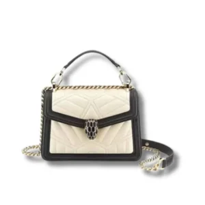 This is a Bvlgari leather Serpenti Diamond Blast handbag with a chain strap, combining white and black hues.